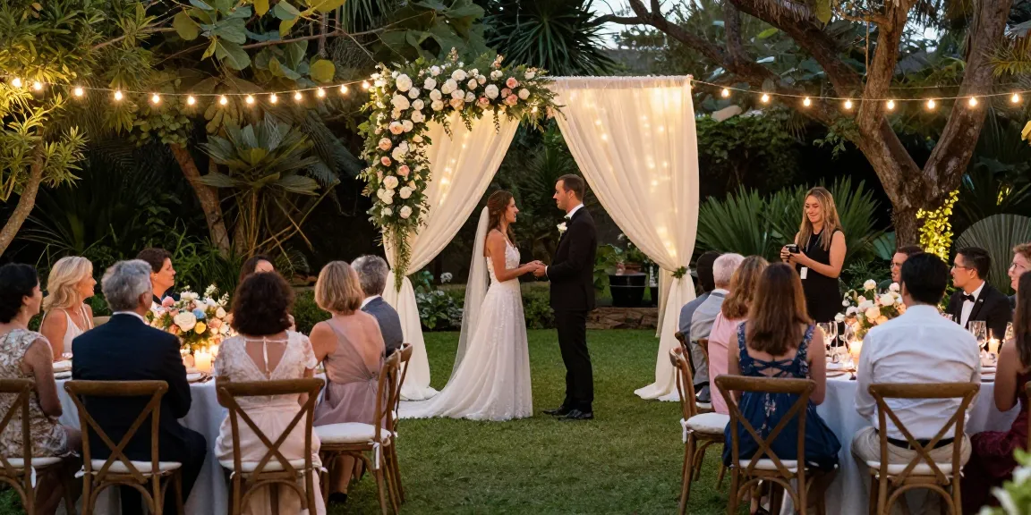 Beautiful outdoor wedding ceremony showcasing event rentals with floral arch and elegant decor.
